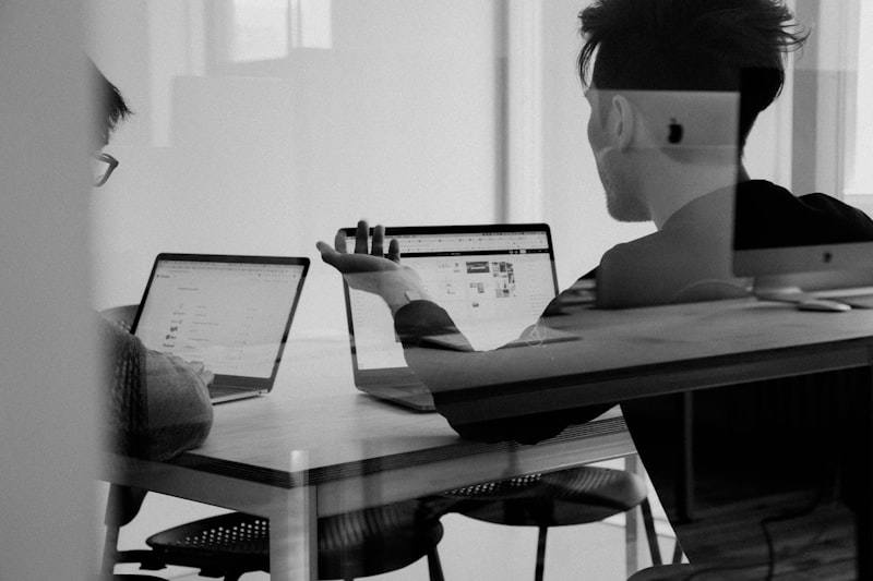 Team reviewing automation performance metrics on a screen